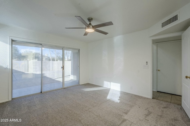 carpeted empty room with ceiling fan