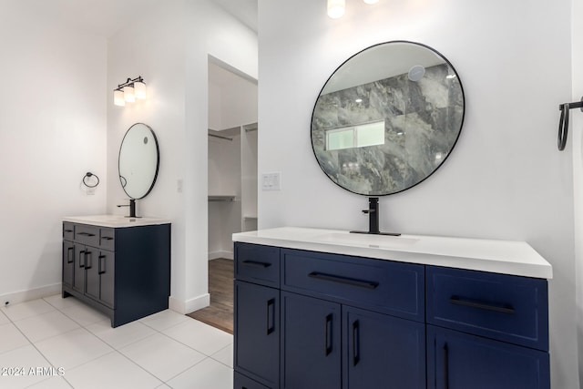 bathroom with hardwood / wood-style floors and vanity