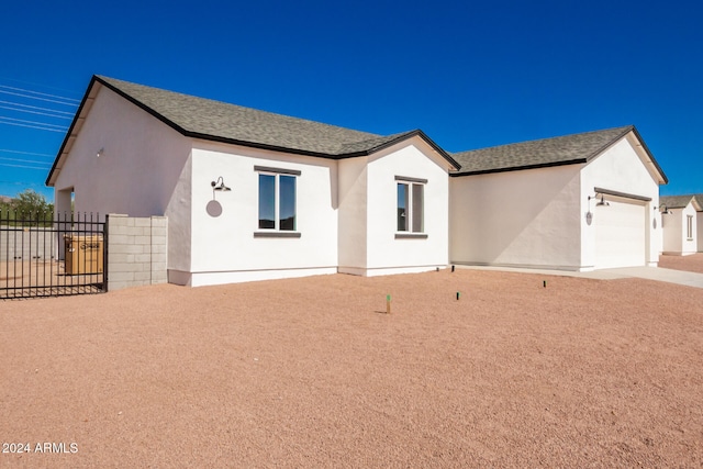 view of front of property with a garage