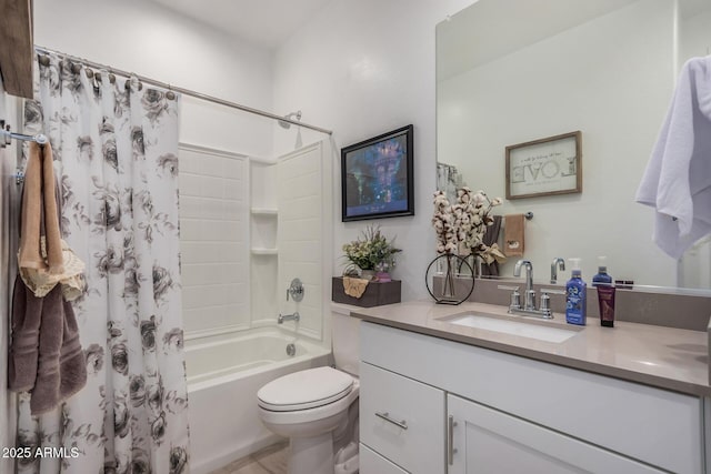 full bathroom with vanity, shower / tub combo, and toilet