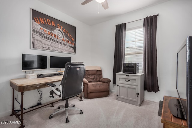 office area with ceiling fan and light colored carpet