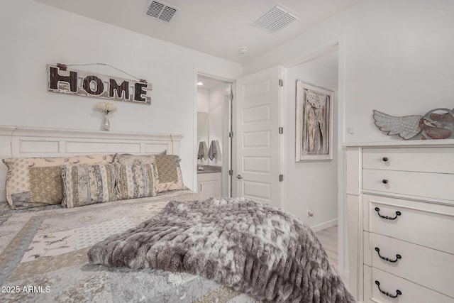 bedroom with wood-type flooring