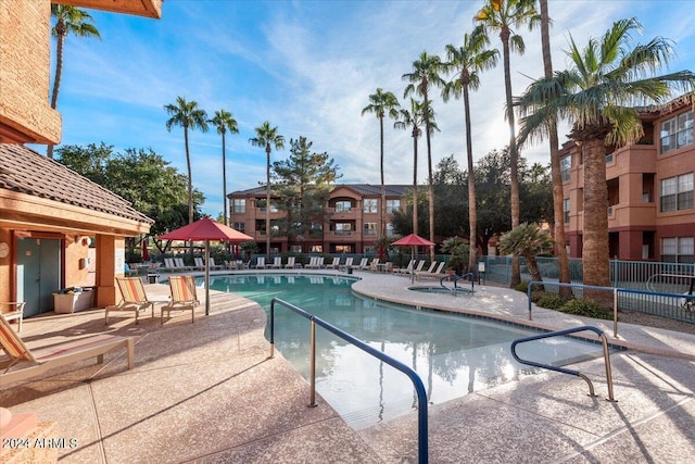 view of swimming pool featuring a patio