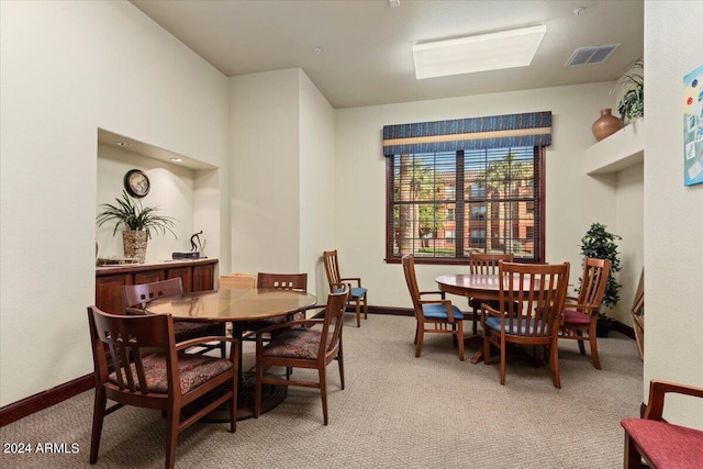 dining area featuring carpet floors