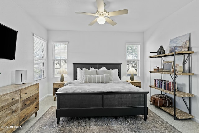 bedroom featuring ceiling fan and carpet floors