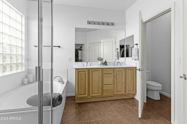 full bathroom featuring tile patterned floors, vanity, toilet, and plus walk in shower