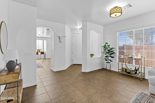 interior space featuring light tile patterned floors