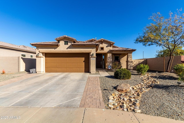 view of front of property featuring a garage