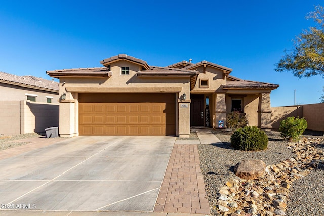 view of front of property with a garage