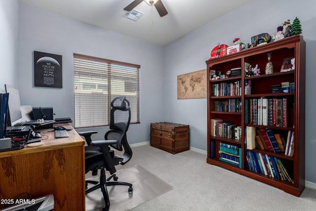 office space with ceiling fan and light colored carpet