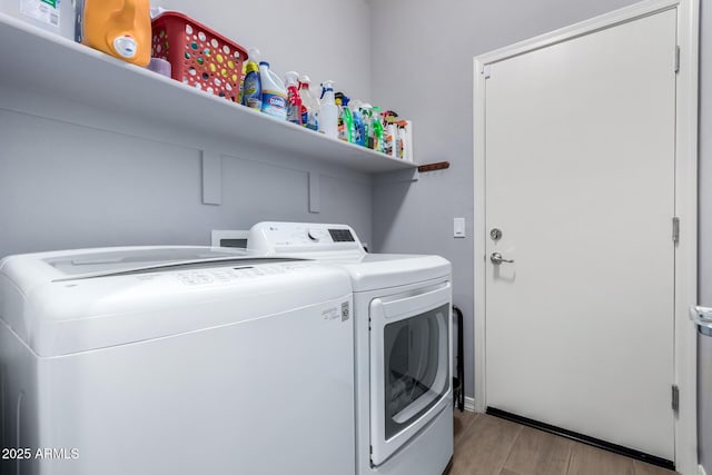 laundry room with washer and dryer