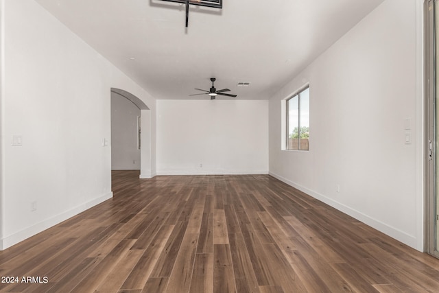 unfurnished room with ceiling fan and hardwood / wood-style flooring