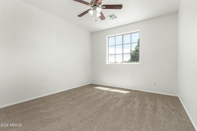 carpeted empty room with ceiling fan