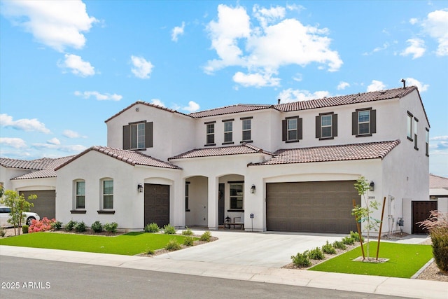 3919 W Abalone Ln, San Tan Valley, AZ 85144 - mediterranean / spanish-style home featuring stucco siding, a tiled roof, driveway, and an attached garage
