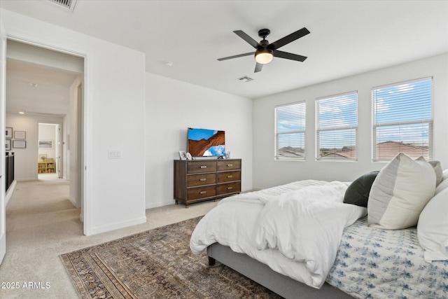 3919 W Abalone Ln, San Tan Valley, AZ 85144 - bedroom featuring light carpet, baseboards, and a ceiling fan