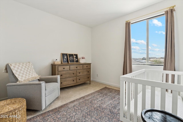 3919 W Abalone Ln, San Tan Valley, AZ 85144 - bedroom featuring carpet flooring, a crib, and baseboards
