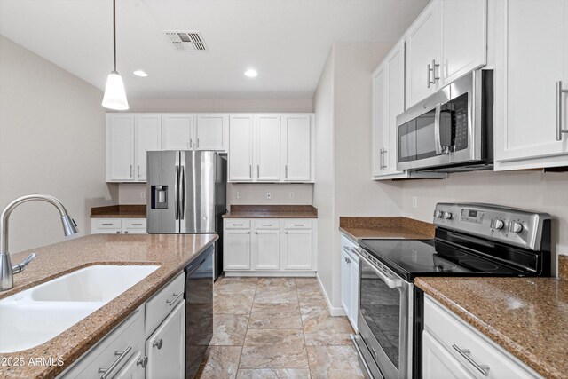 12727 W Lowden Rd, Peoria, AZ 85383 - kitchen featuring appliances with stainless steel finishes, a sink, white cabinetry, and recessed lighting
