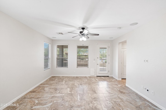 12727 W Lowden Rd, Peoria, AZ 85383 - unfurnished room featuring ceiling fan and baseboards