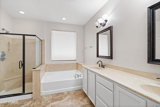 12727 W Lowden Rd, Peoria, AZ 85383 - bathroom featuring a shower stall, a garden tub, double vanity, and recessed lighting