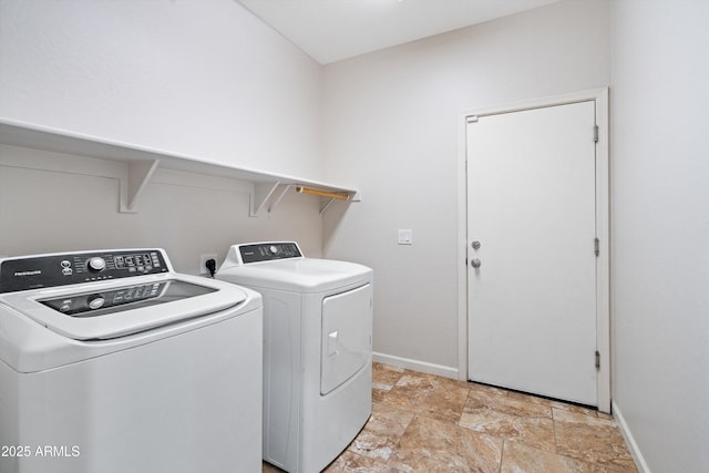 12727 W Lowden Rd, Peoria, AZ 85383 - laundry room featuring washer and clothes dryer, baseboards, and light stone finish floors