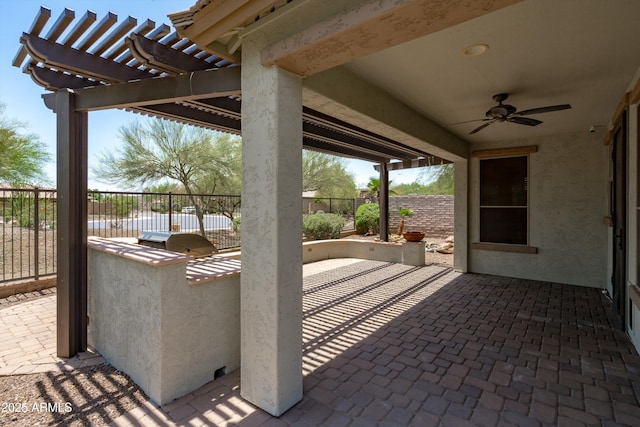 12727 W Lowden Rd, Peoria, AZ 85383 - view of patio / terrace featuring exterior kitchen, a pergola, and a ceiling fan