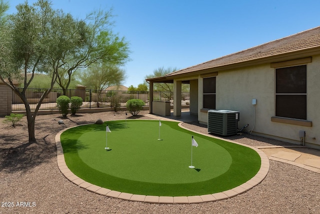 12727 W Lowden Rd, Peoria, AZ 85383 - view of property's community featuring an area to practice putting and a patio area