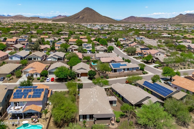 12727 W Lowden Rd, Peoria, AZ 85383 - aerial perspective of suburban area with a mountain backdrop and a pool area