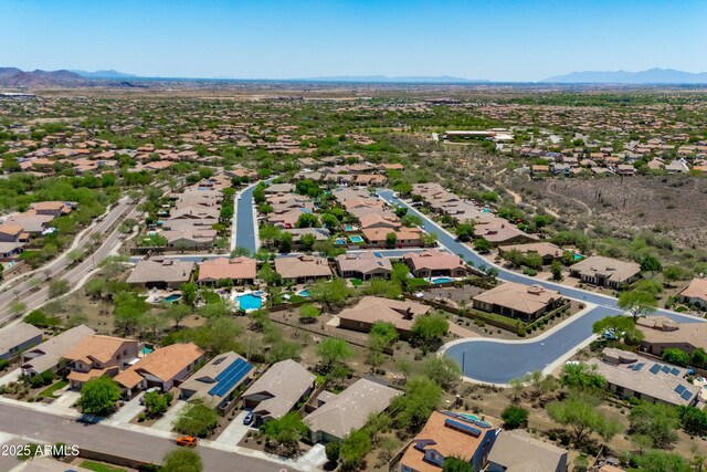 12727 W Lowden Rd, Peoria, AZ 85383 - aerial view of property and surrounding area featuring a mountain backdrop and nearby suburban area