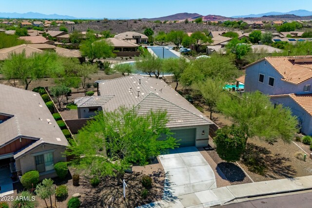 12727 W Lowden Rd, Peoria, AZ 85383 - aerial perspective of suburban area with a mountainous background