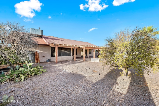 back of house featuring a patio