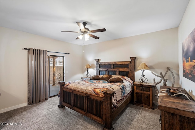 carpeted bedroom with access to exterior and ceiling fan