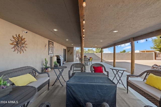 view of patio / terrace featuring outdoor lounge area and a grill