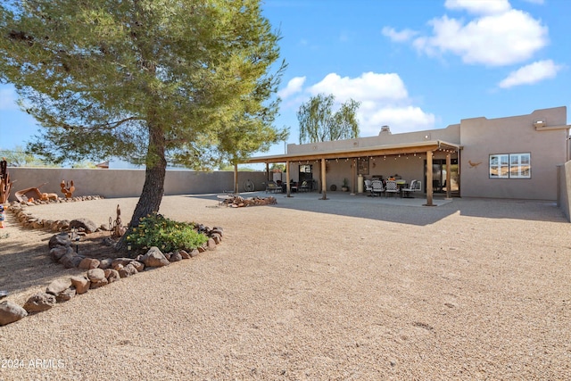 rear view of house featuring a patio area