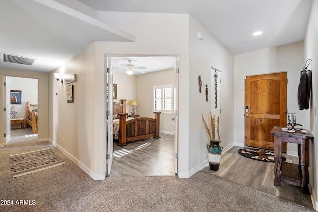 hallway featuring carpet