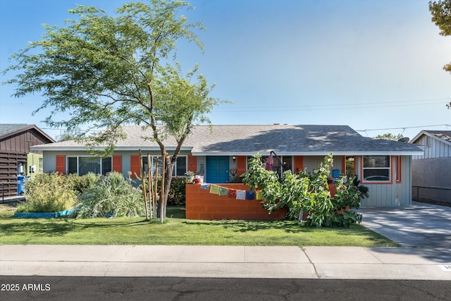 1027 E El Camino Dr, Phoenix, AZ 85020 - ranch-style house with a shingled roof
