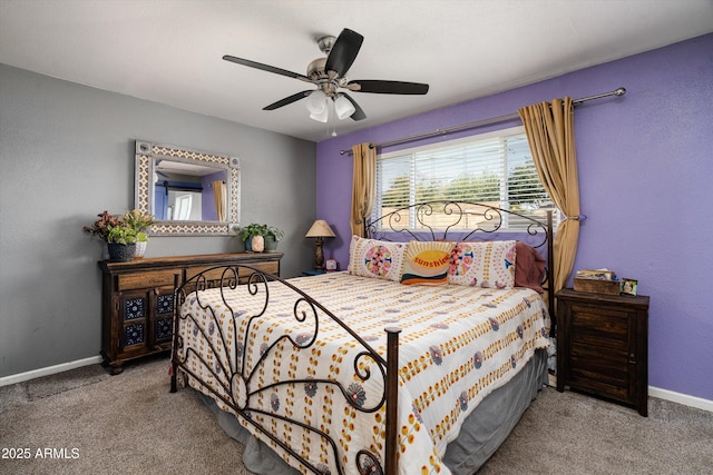 1027 E El Camino Dr, Phoenix, AZ 85020 - carpeted bedroom featuring baseboards and a ceiling fan