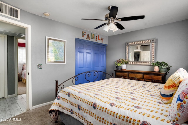 1027 E El Camino Dr, Phoenix, AZ 85020 - carpeted bedroom featuring a closet, baseboards, and ceiling fan