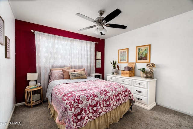 1027 E El Camino Dr, Phoenix, AZ 85020 - carpeted bedroom featuring baseboards and ceiling fan