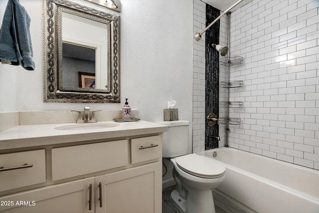 1027 E El Camino Dr, Phoenix, AZ 85020 - bathroom with vanity, toilet, and shower / washtub combination