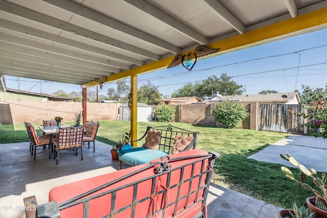 1027 E El Camino Dr, Phoenix, AZ 85020 - view of patio with outdoor dining space and an outdoor living space