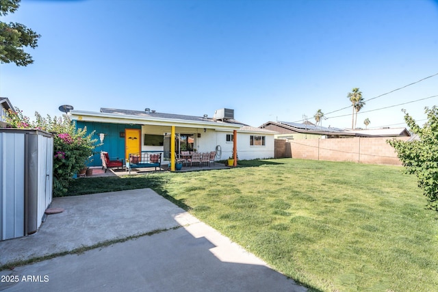 1027 E El Camino Dr, Phoenix, AZ 85020 - rear view of house with a patio and central air condition unit