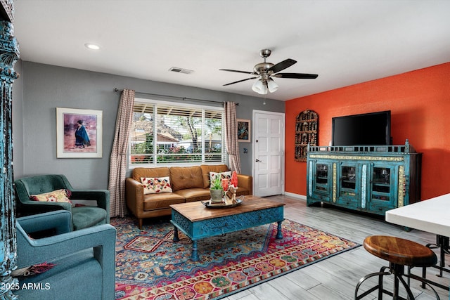 1027 E El Camino Dr, Phoenix, AZ 85020 - living area featuring a ceiling fan, wood finished floors, recessed lighting, and baseboards