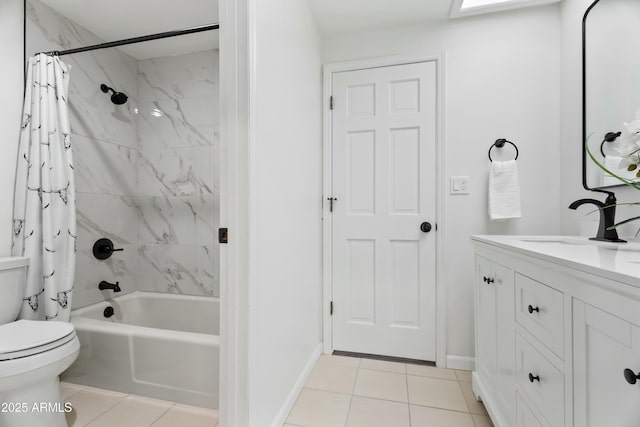 bathroom with vanity, tile patterned floors, and shower / bath combo with shower curtain