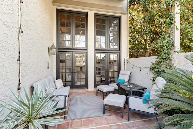 view of patio with french doors and outdoor lounge area