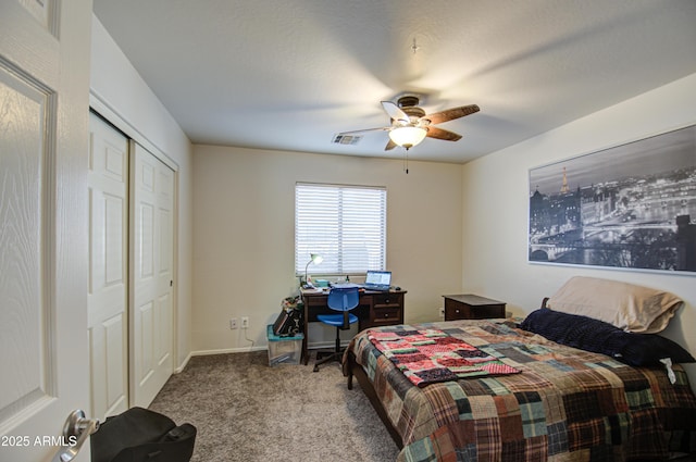 carpeted bedroom with ceiling fan