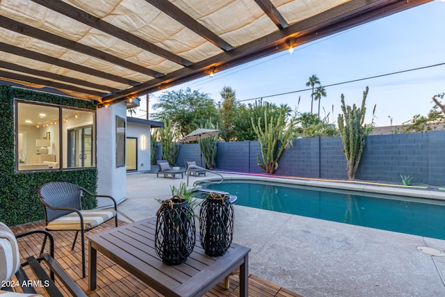 view of swimming pool featuring a pergola and a patio