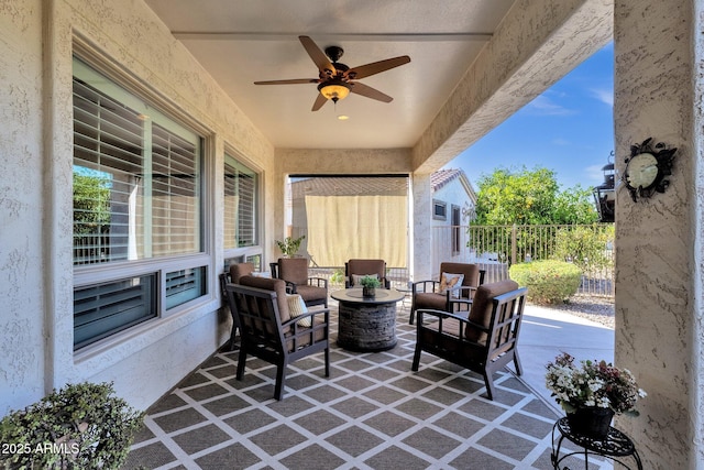 view of patio featuring ceiling fan and outdoor lounge area
