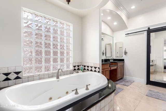 bathroom with crown molding, vanity, tiled bath, and plenty of natural light