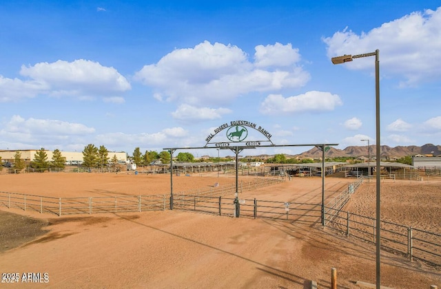 view of property's community with a mountain view and a rural view