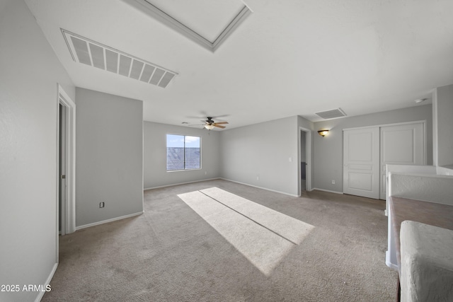 9719 W Heber Rd, Tolleson, AZ 85353 - interior space with visible vents, a ceiling fan, carpet, and baseboards
